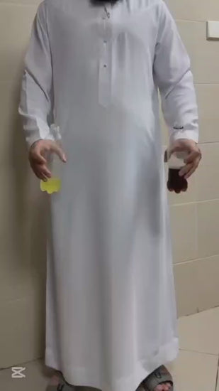 Soda qui coule sur un qamis imperméable blanc sans laisser de tache 
